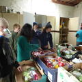 A group of white people in a rustic style kitchen