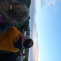 A group of people watching seabirds. The photo is taken from behind