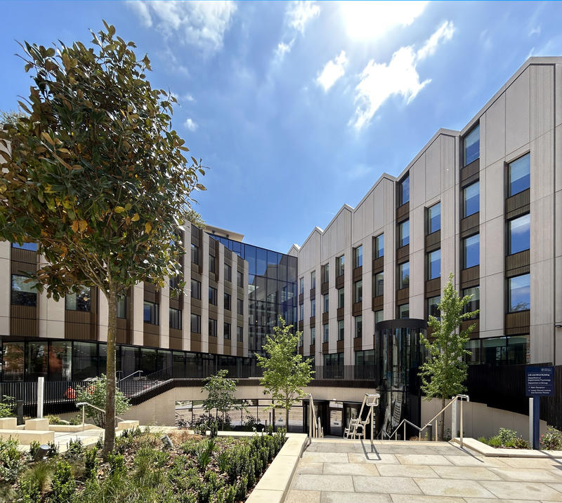 A photo of the front of the Life and Mind Building