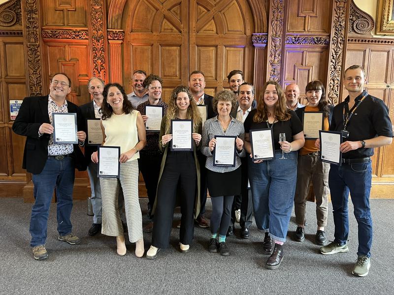 Img The shortlisted biology teams stand with the joint heads of departments.