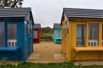 Four colourful pigeon lofts