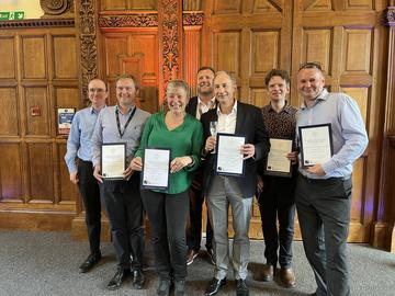 Img The LaMB team at the VC awards holding their shortlisted certificates