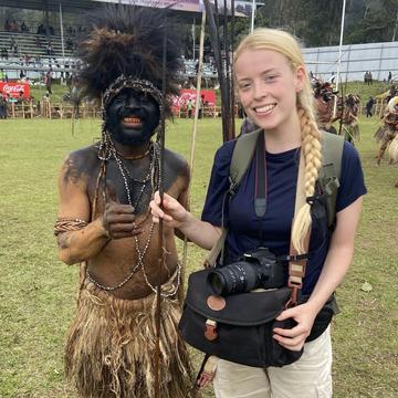 Enga cultural show Juliet Turner stands with a participant in the Enga cultural show