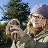 Sophie Lund-Rassmussen holding a hedgehog